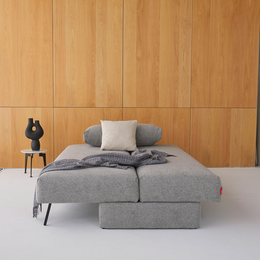 Arlmess ash grey storage sofa bed shown open to the besd position