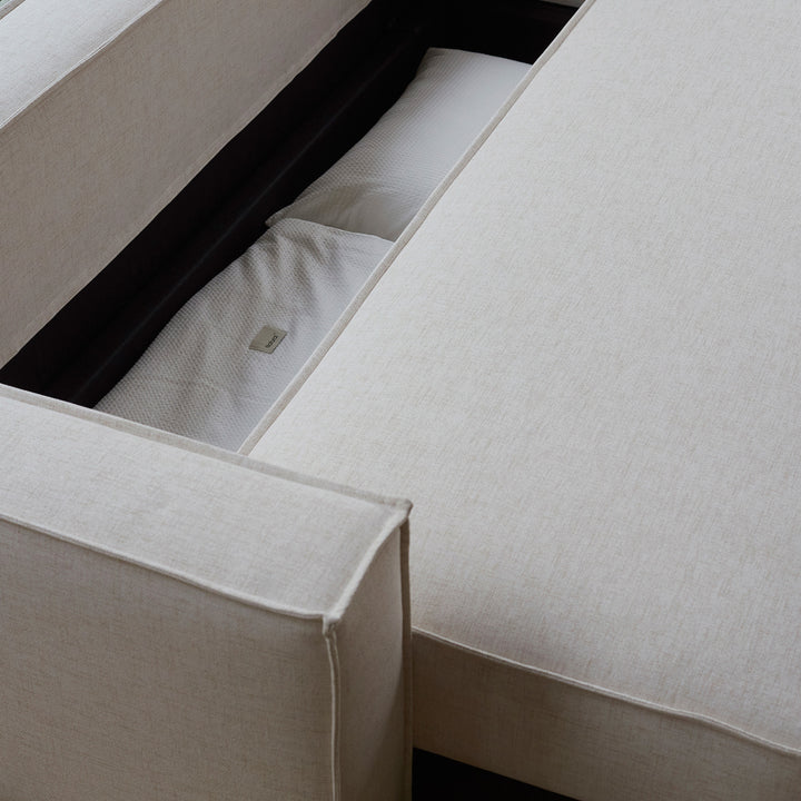 Play sofa bed open to show the storage space inside